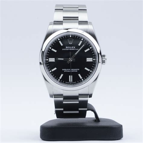 rolex op 36mm black dial.